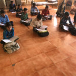 Teaching kids at Boys Hostel