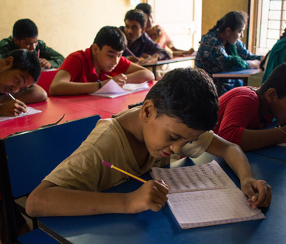 Kids Learning to write at STK