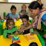 Volunteer at STK teaching kids