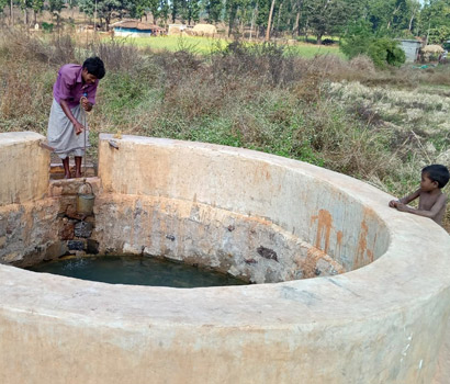 Villagers using well dug up